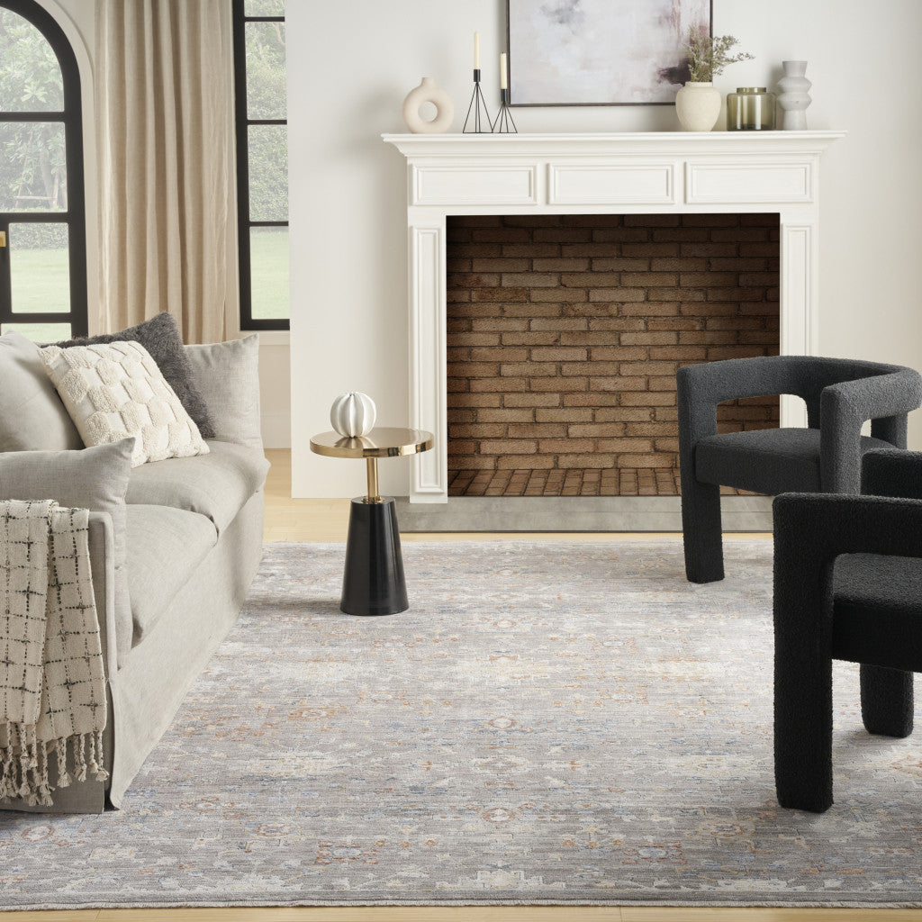 8' x 10' Ivory Blue and Gray Oriental Power Loom Distressed Area Rug With Fringe