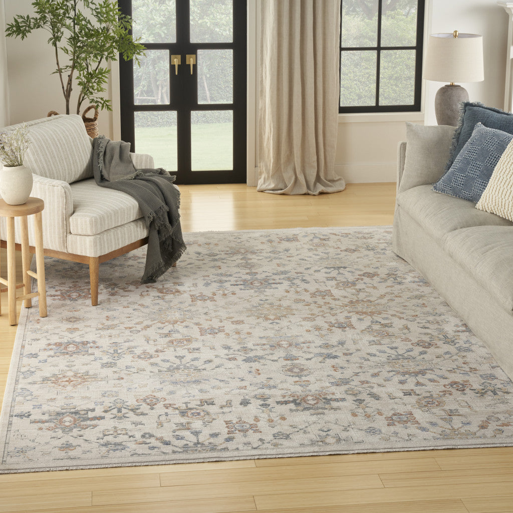 5' x 8' Ivory and Gray Oriental Power Loom Distressed Area Rug With Fringe
