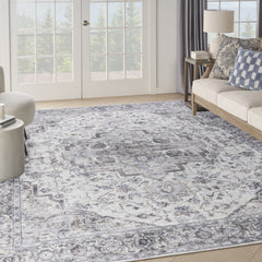 9' x 12' Beige and Ivory Floral Power Loom Distressed Washable Area Rug