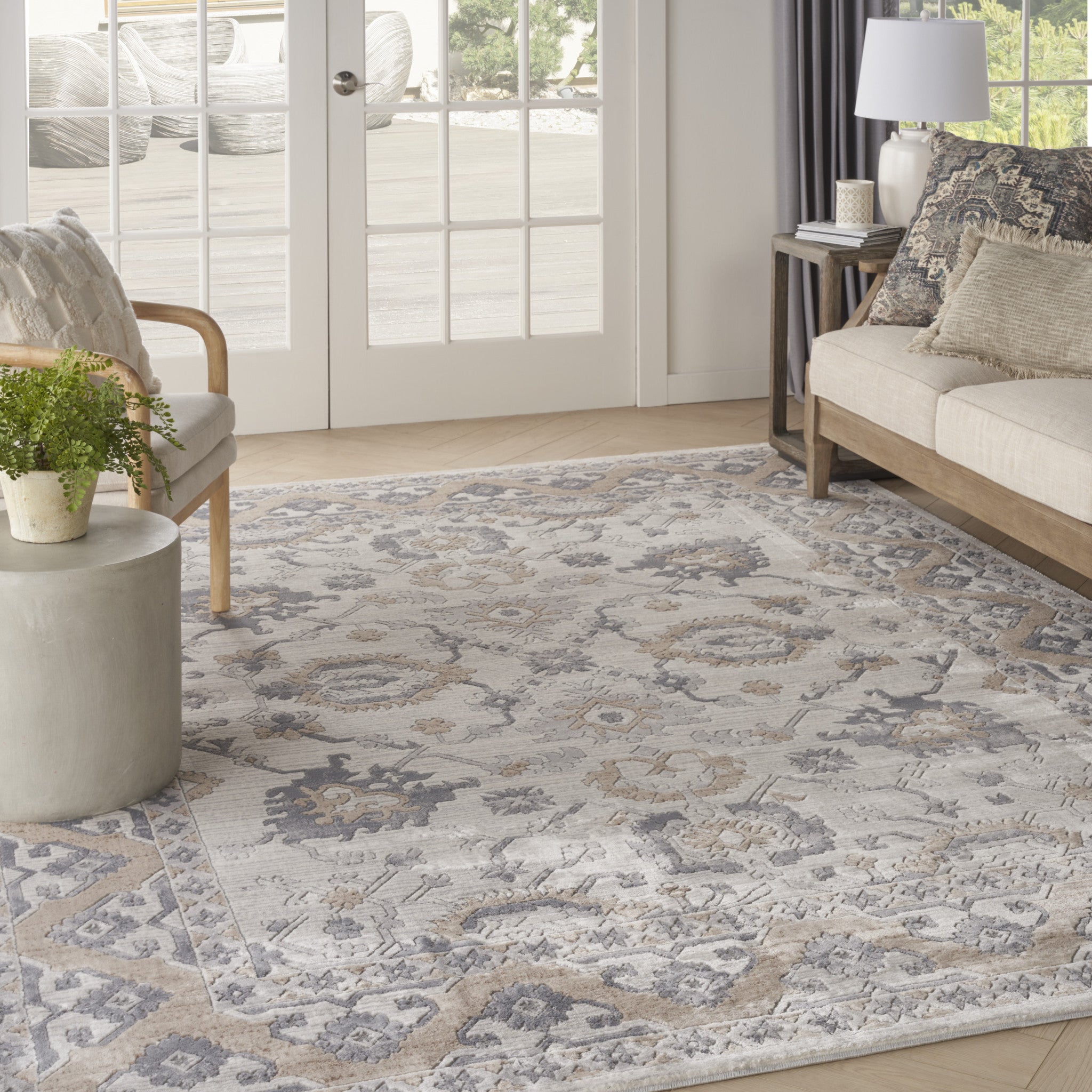 9' x 12' Gray and Ivory Oriental Power Loom Area Rug