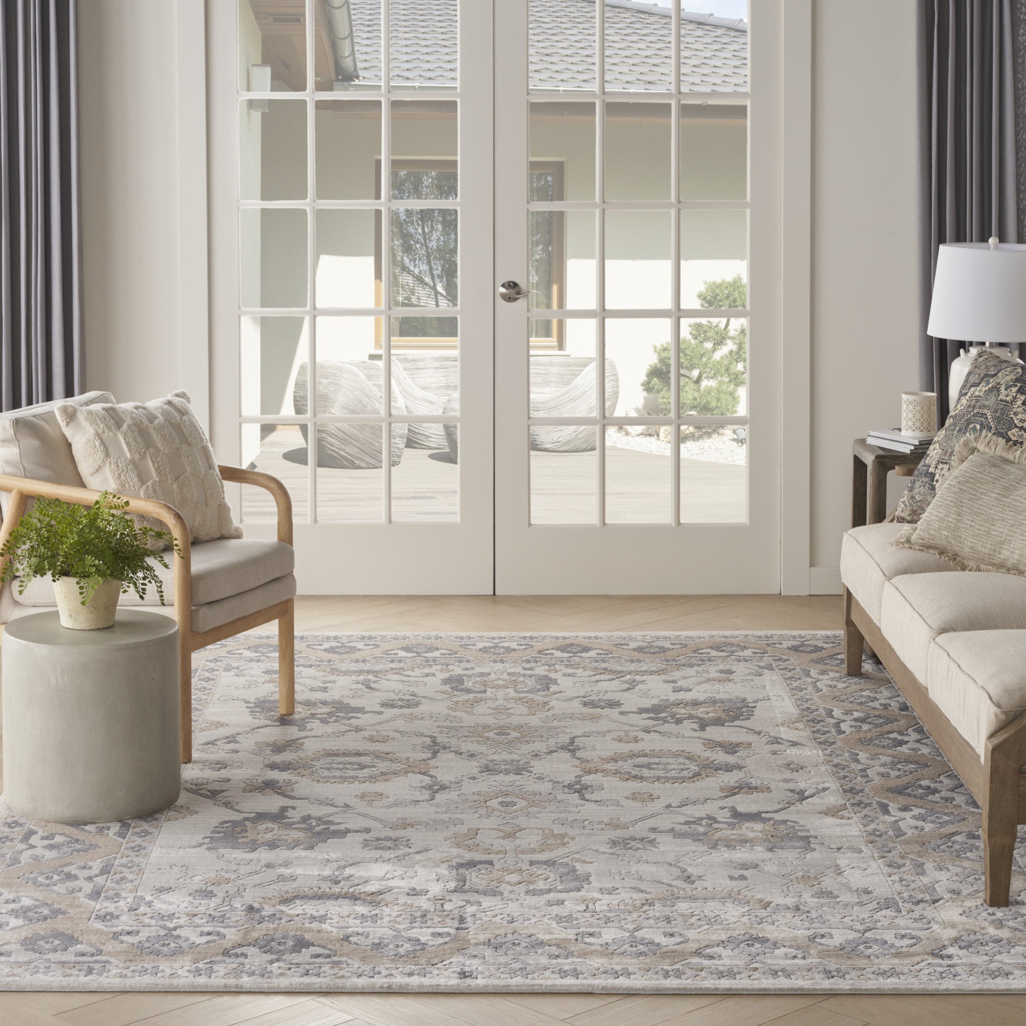 9' x 12' Gray and Ivory Oriental Power Loom Area Rug