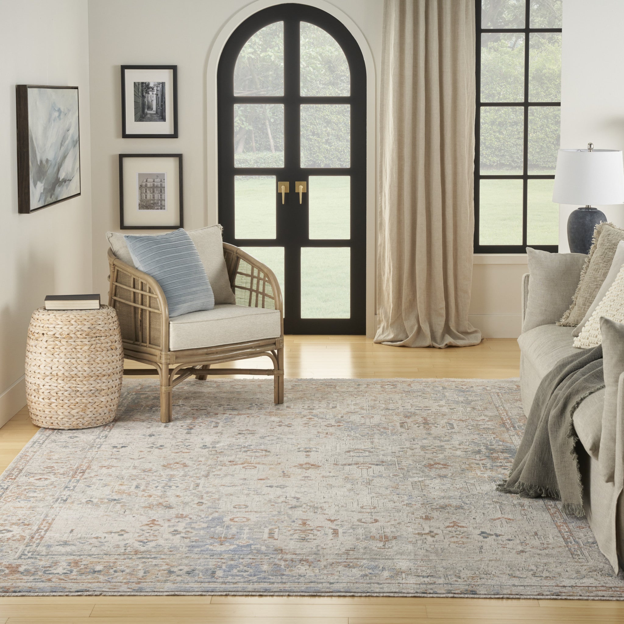 8' x 10' Ivory Blue and Orange Oriental Power Loom Distressed Area Rug With Fringe