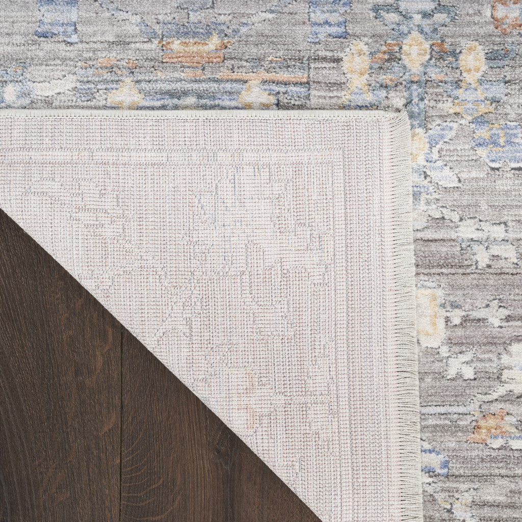 5' x 8' Gray and Ivory Oriental Power Loom Distressed Area Rug With Fringe