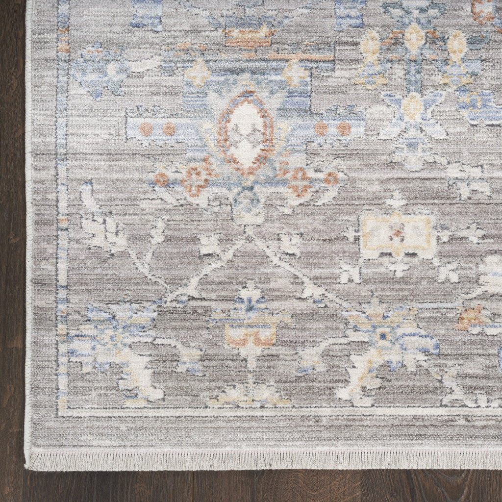 5' x 8' Gray and Ivory Oriental Power Loom Distressed Area Rug With Fringe