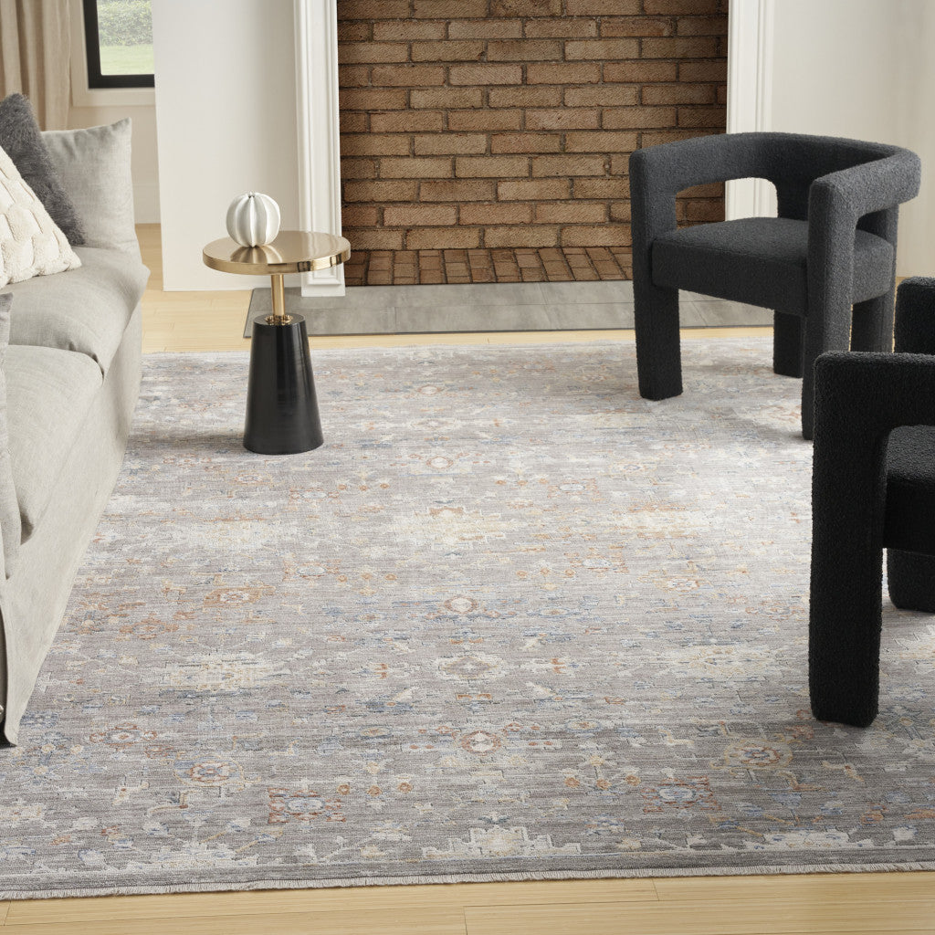 5' x 8' Gray and Ivory Oriental Power Loom Distressed Area Rug With Fringe