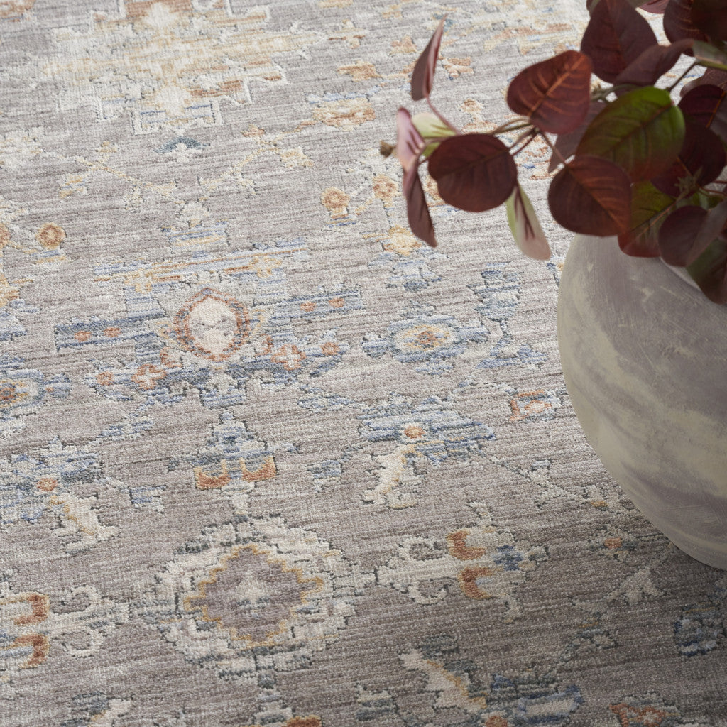 5' x 8' Gray and Ivory Oriental Power Loom Distressed Area Rug With Fringe