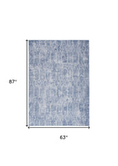 5' x 7' Blue and Off White Geometric Power Loom Washable Area Rug