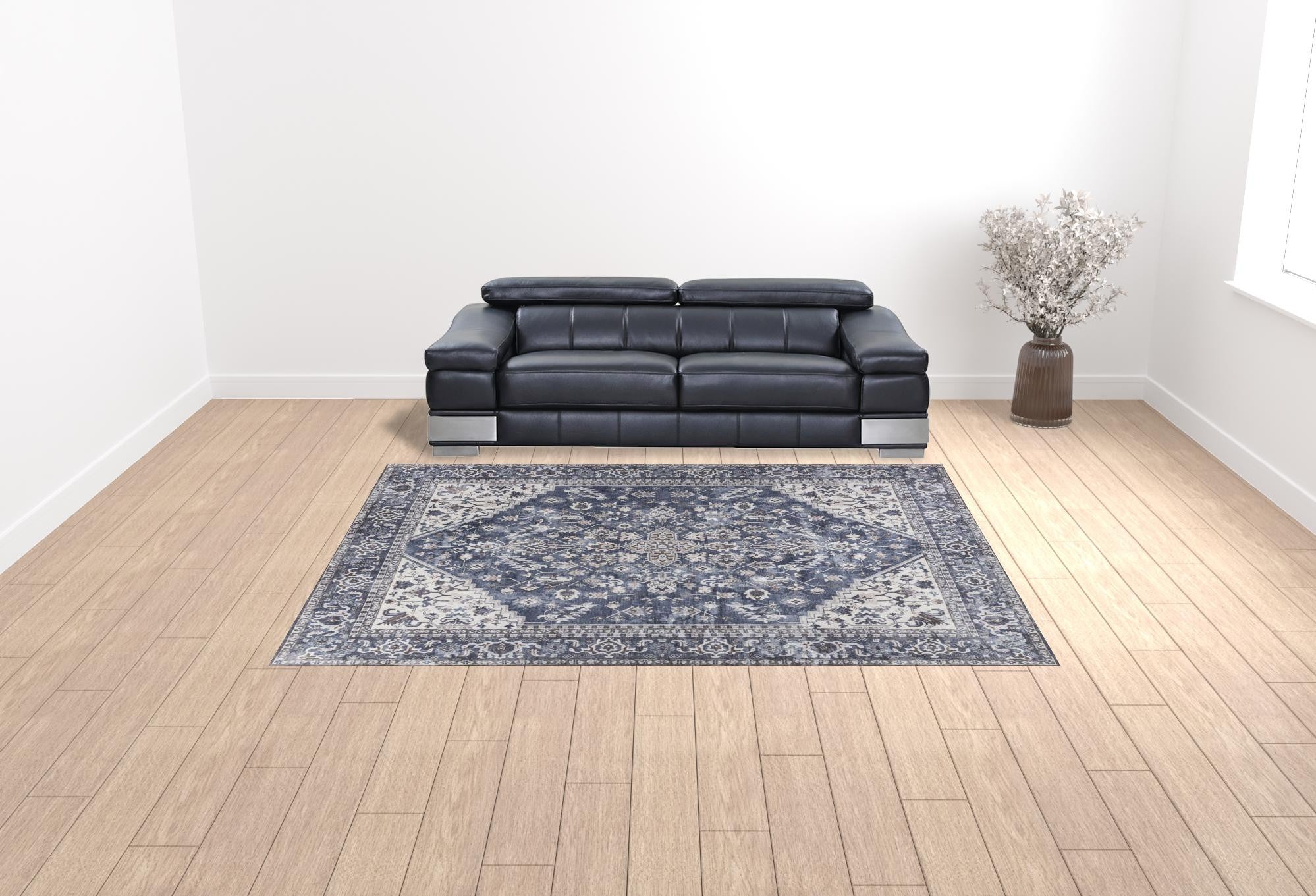 9' x 12' Blue and Ivory Floral Power Loom Distressed Washable Area Rug