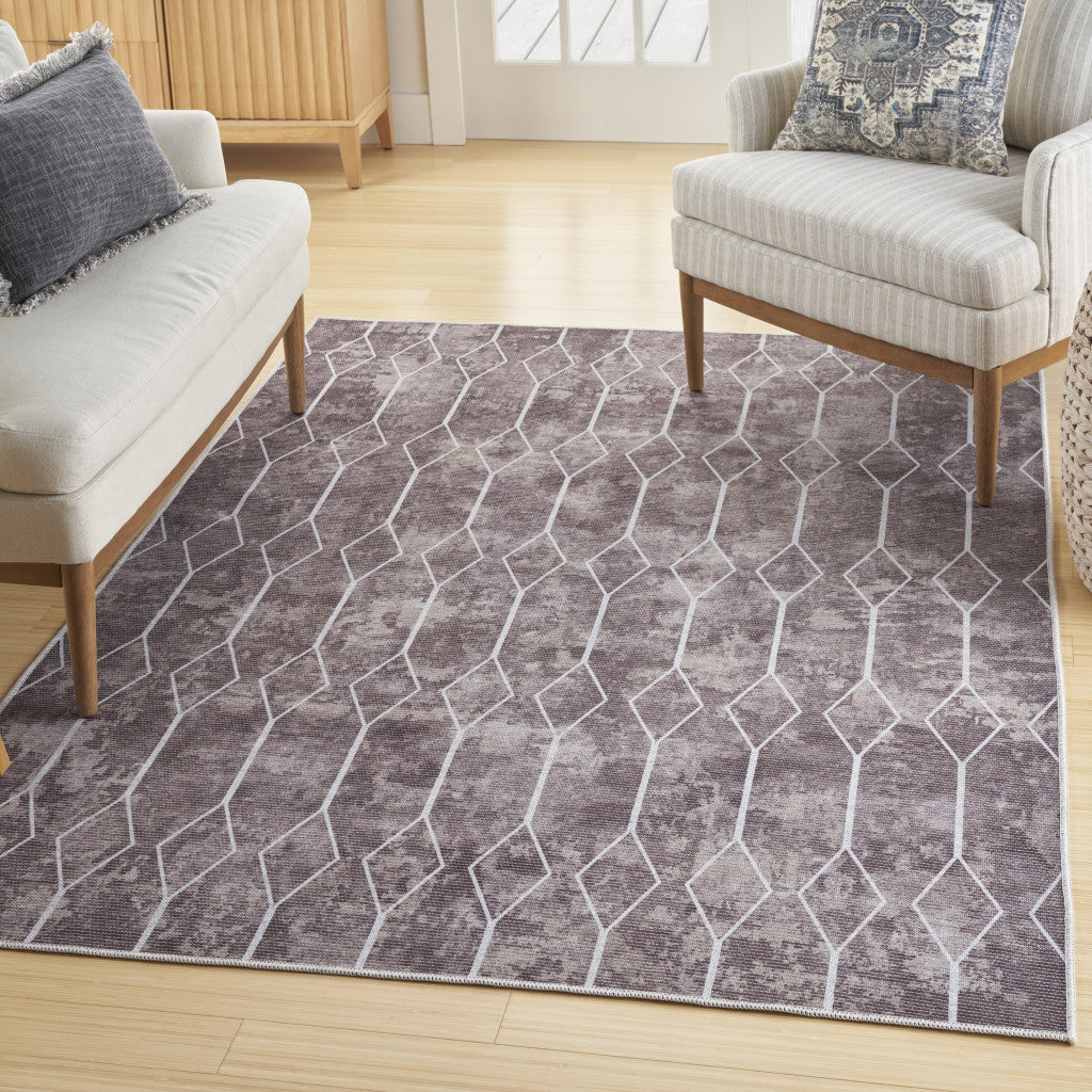 6' x 9' Brown and Ivory Geometric Power Loom Washable Area Rug