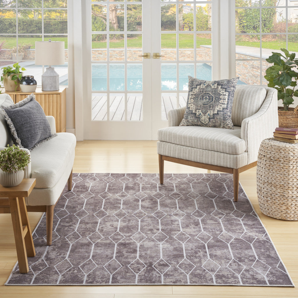 6' x 9' Brown and Ivory Geometric Power Loom Washable Area Rug