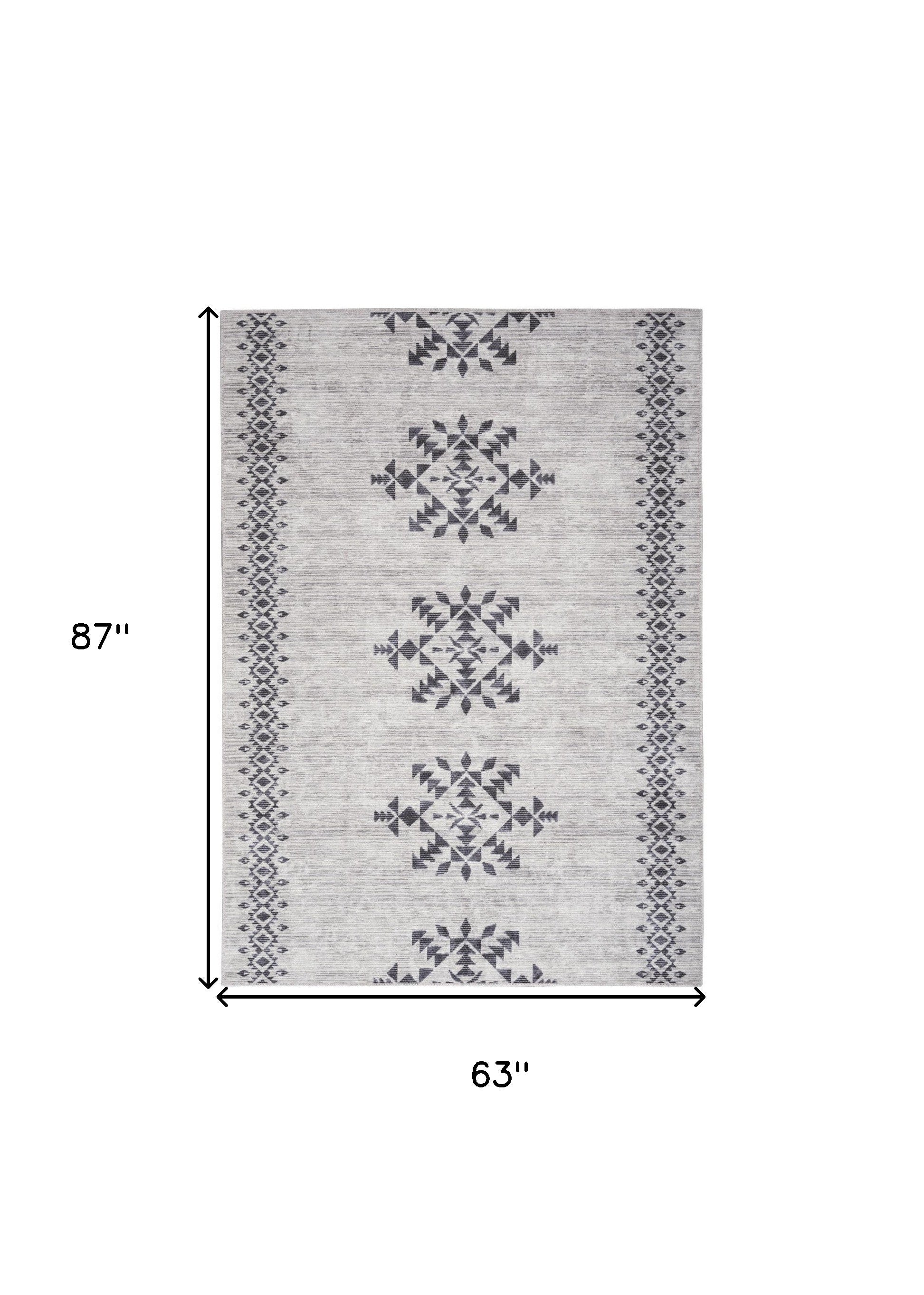 5' x 7' Gray and Ivory Geometric Power Loom Washable Area Rug