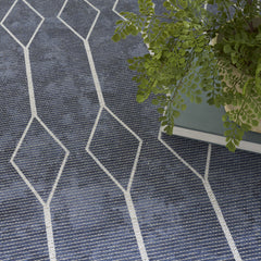 6' x 9' Blue and Ivory Geometric Power Loom Washable Area Rug