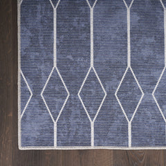 5' x 7' Blue and Ivory Geometric Power Loom Washable Area Rug