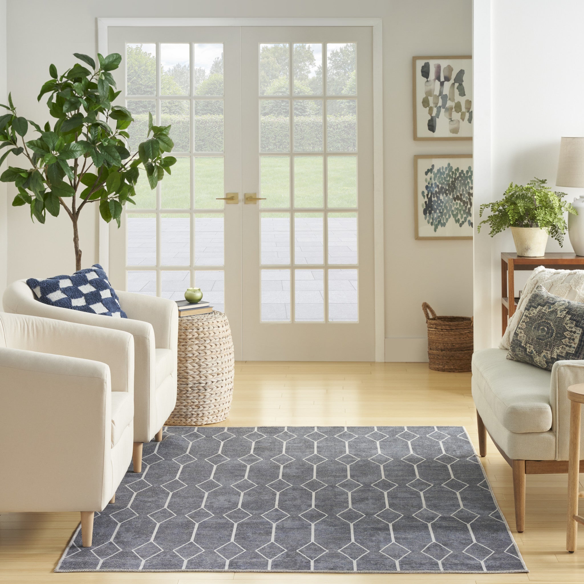 5' x 7' Blue and Ivory Geometric Power Loom Washable Area Rug