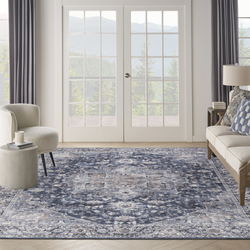 9' x 12' Blue and Ivory Floral Power Loom Distressed Washable Area Rug