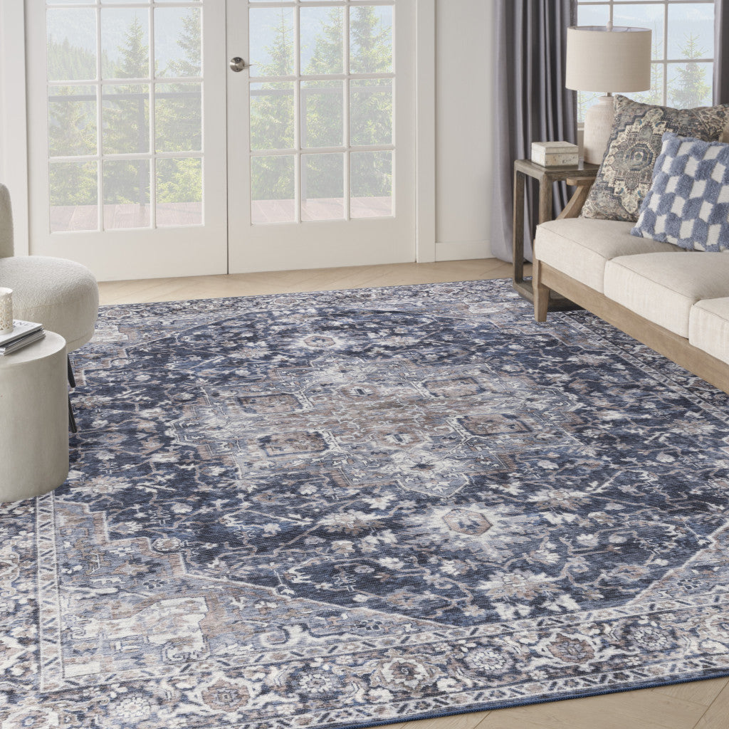 9' x 12' Blue and Ivory Floral Power Loom Distressed Washable Area Rug