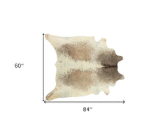 5' x 7' Brown and White Cowhide Hand Knotted Area Rug