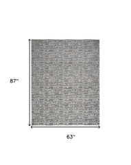 5' x 7' Blue Geometric Distressed Area Rug