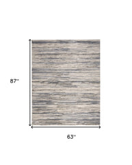 5' x 7' Cream Abstract Distressed Area Rug