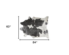 5' x 7' Black and White Cowhide Hand Knotted Area Rug