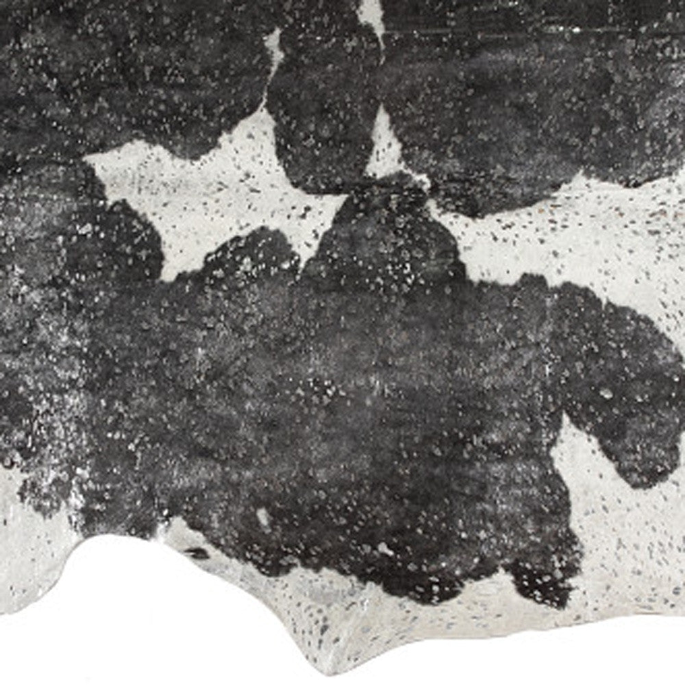 5' x 7' Black and White Cowhide Hand Knotted Area Rug