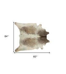 5' x 7' Brown and White Cowhide Hand Knotted Area Rug