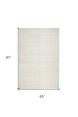 5' x 7' Cream Geometric Area Rug