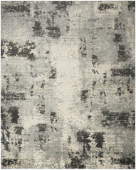 5' x 7' Cream Abstract Area Rug