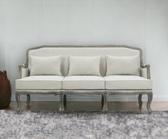 76" Cream Linen And Brown Sofa