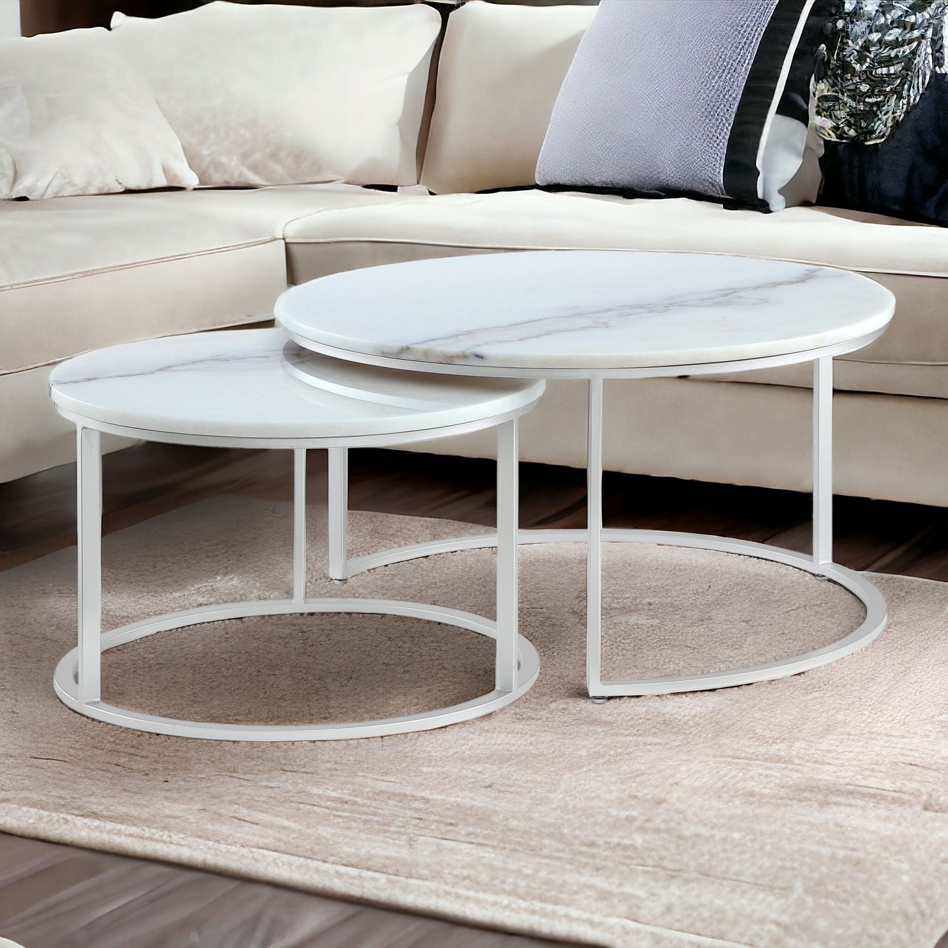 Set of Two 31" White And Silver Genuine Marble And Iron Round Nested Coffee Tables