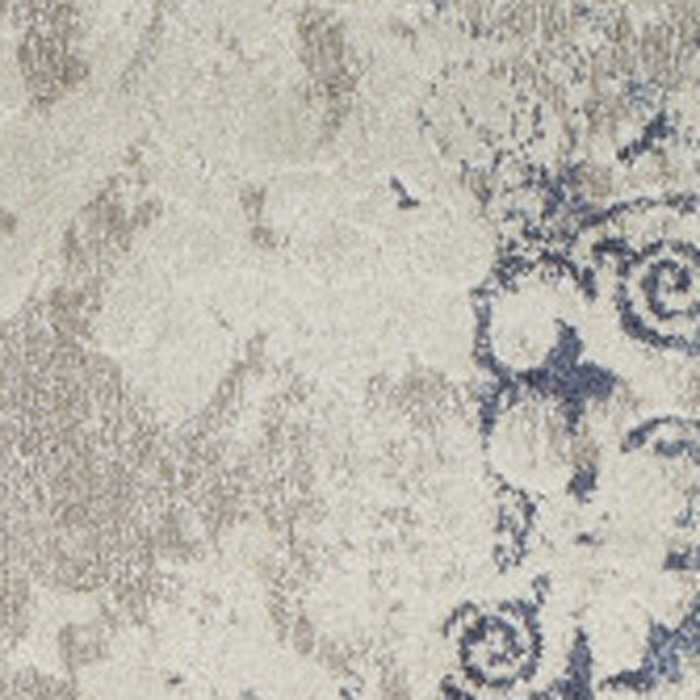 10' x 13' Blue and Ivory Oriental Distressed Area Rug