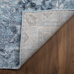 5' x 8' Blue and Ivory Oriental Distressed Area Rug