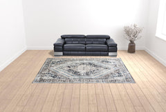 9' X 13' Gray Beige and Blue Geometric Distressed Area Rug With Fringe