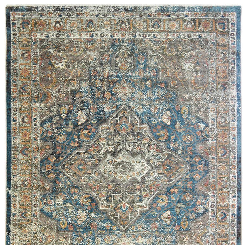 5' x 8' Blue and Brown Oriental Distressed Area Rug With Fringe