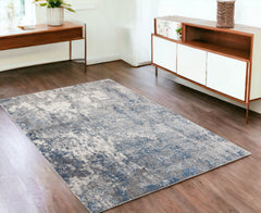 4' x 6' Gray and Beige Abstract Power Loom Area Rug
