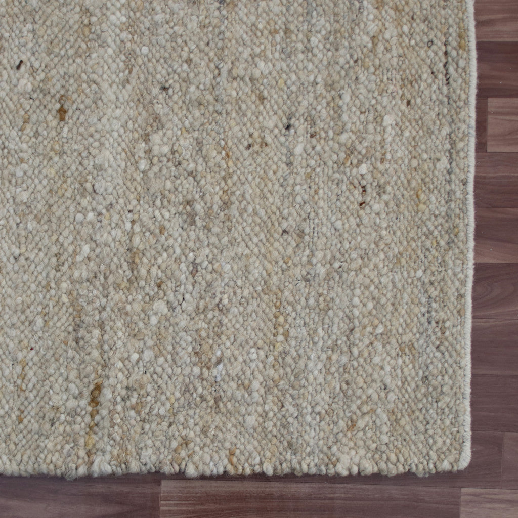 9' x 12' Beige and White Hand Woven Area Rug