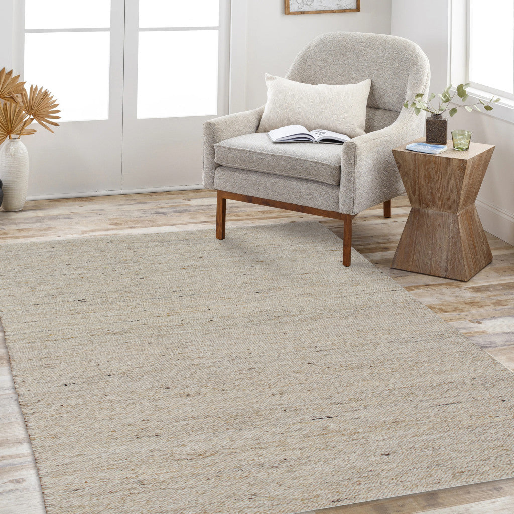 9' x 12' Beige and White Hand Woven Area Rug