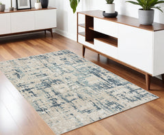 4' x 6' Blue and Gray Abstract Power Loom Area Rug