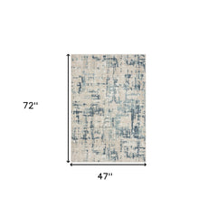 4' x 6' Blue and Gray Abstract Power Loom Area Rug