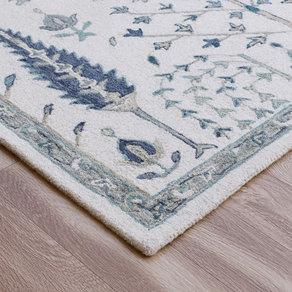 8' x 10' Ivory and Blue Wool Floral Hand Tufted Area Rug
