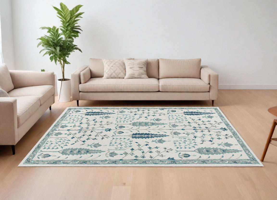 8' x 10' Ivory and Blue Wool Floral Hand Tufted Area Rug
