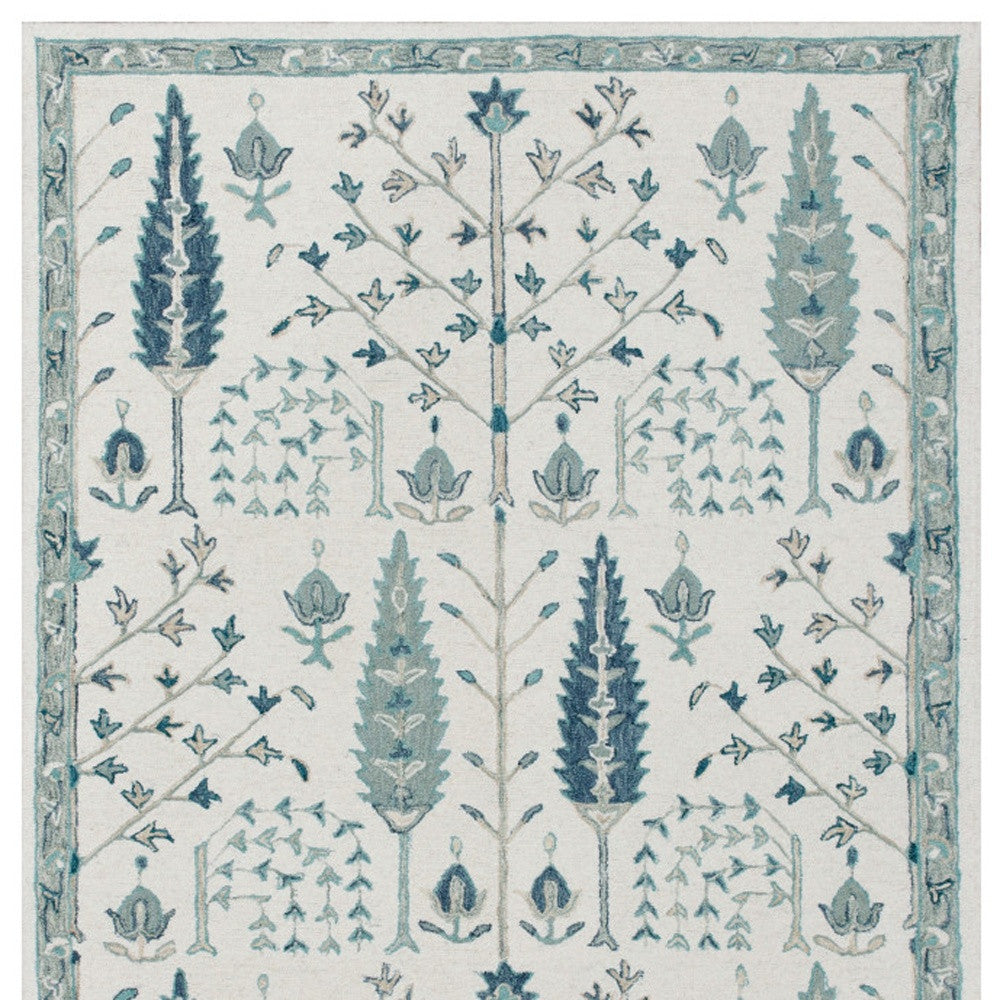8' x 10' Ivory and Blue Wool Floral Hand Tufted Area Rug