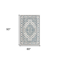 5' x 8' Blue and Ivory Wool Floral Hand Tufted Area Rug