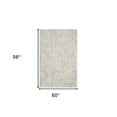 5' x 8' Ivory and Gray Abstract Area Rug