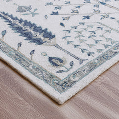 5' x 8' Ivory and Blue Wool Floral Hand Tufted Area Rug
