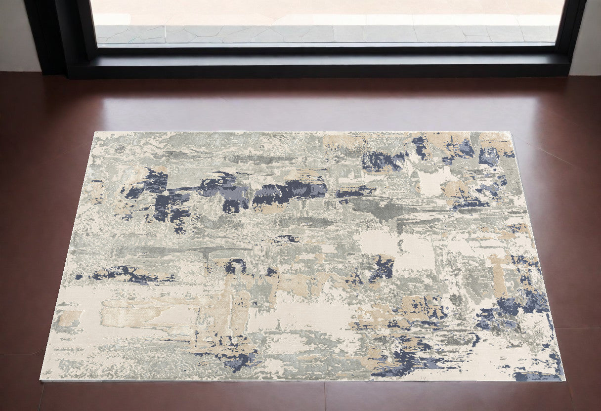 2' x 3' Blue and Beige Abstract Area Rug