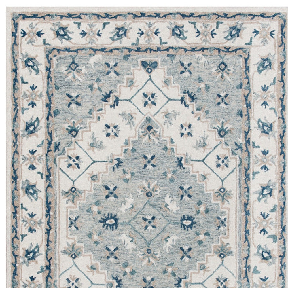 8' x 10' Blue and Ivory Wool Floral Hand Tufted Area Rug