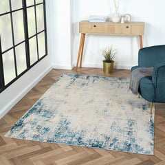 5' x 8' Blue and Ivory Abstract Area Rug