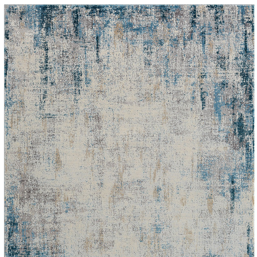 5' x 8' Blue and Ivory Abstract Area Rug