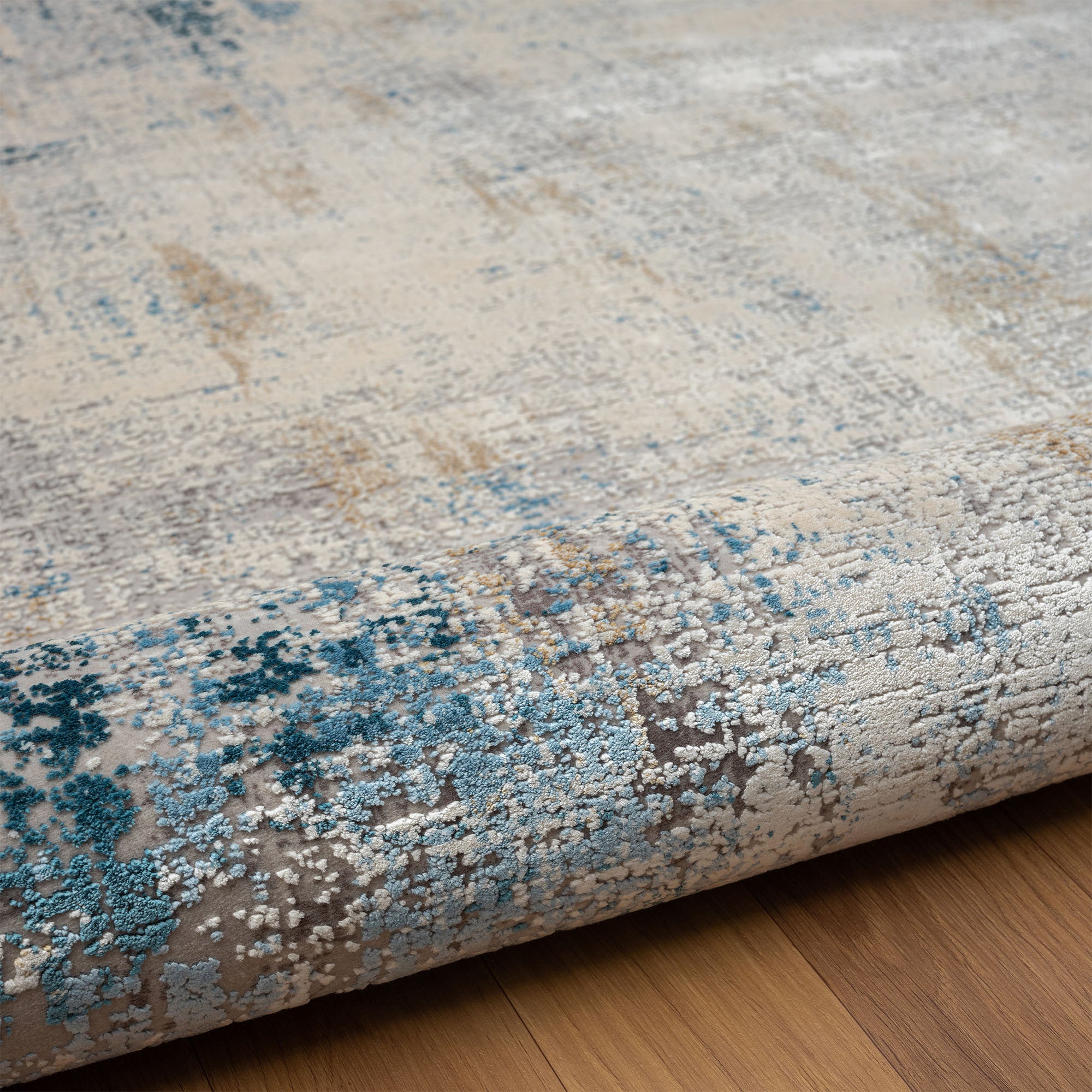5' x 8' Blue and Ivory Abstract Area Rug